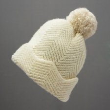 Kremowy pompon
